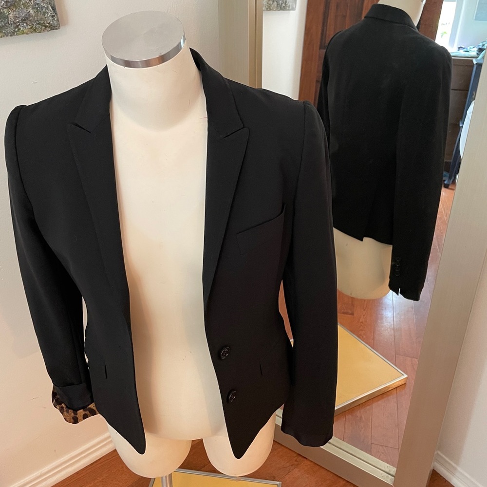 Dolce Gabbana black suit jacket with leopard satin lining.